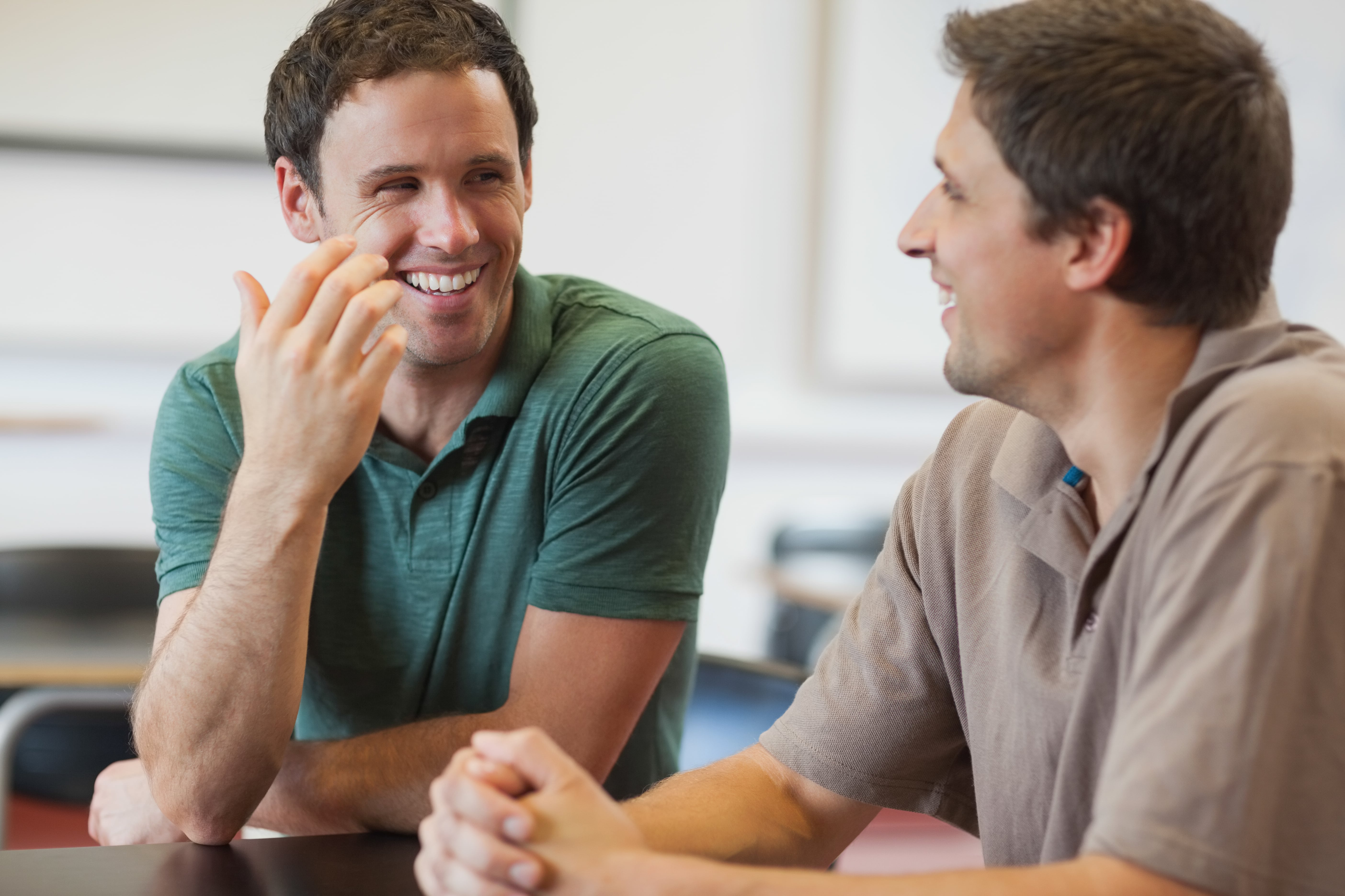 Two men talking